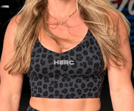 HERC EDGE Black Leopard crop top worn with matching leggings, sold separately